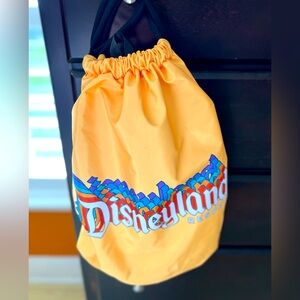Disneyland Resort Retro Stack Logo Yellow Drawstring Backpack Unisex